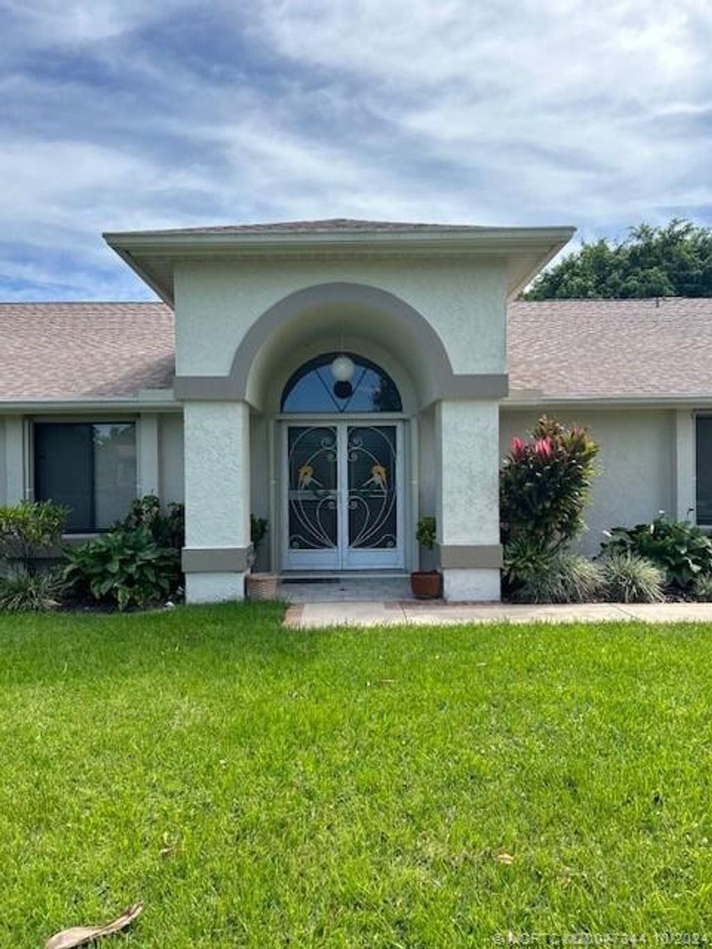 Photo of 2109 NE Ginger Terrace, Jensen Beach, FL 34957 (MLS # M20047344)