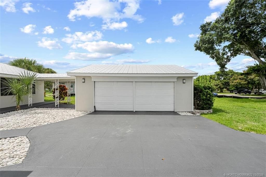 Photo of 1134 NW Spruce Ridge Drive, Stuart, FL 34994 (MLS # M20053622)