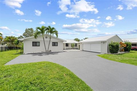 Photo of 1134 NW Spruce Ridge Drive, Stuart, FL 34994 (MLS # M20053622)