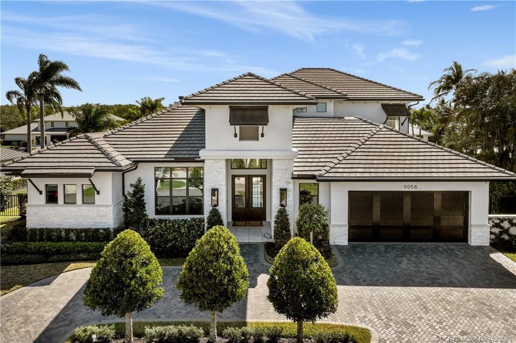 Photo of 9058 SE Star Island Way, Hobe Sound, FL 33455 (MLS # M20054339)