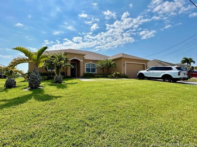 Photo of 2041 SW Imperial Street, Port Saint Lucie, FL 34987 (MLS # M20045234)