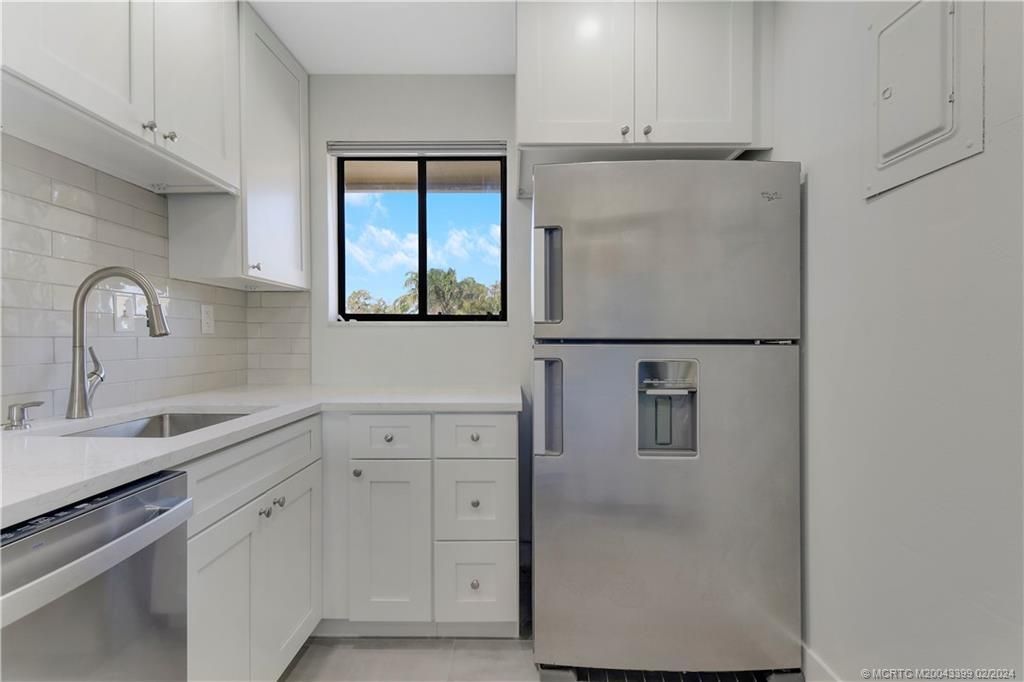 Photo of 5313 SE Miles Grant Road #202, Stuart, FL 34997 (MLS # M20043399)