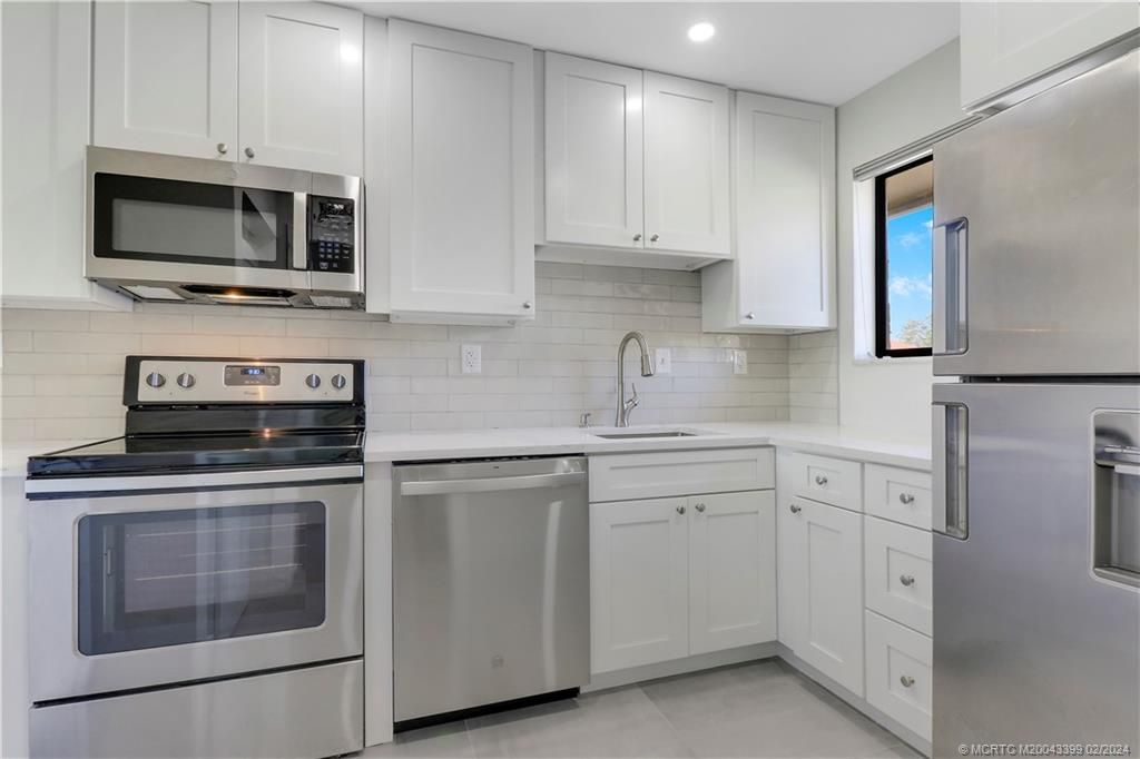 Photo of 5313 SE Miles Grant Road #202, Stuart, FL 34997 (MLS # M20043399)