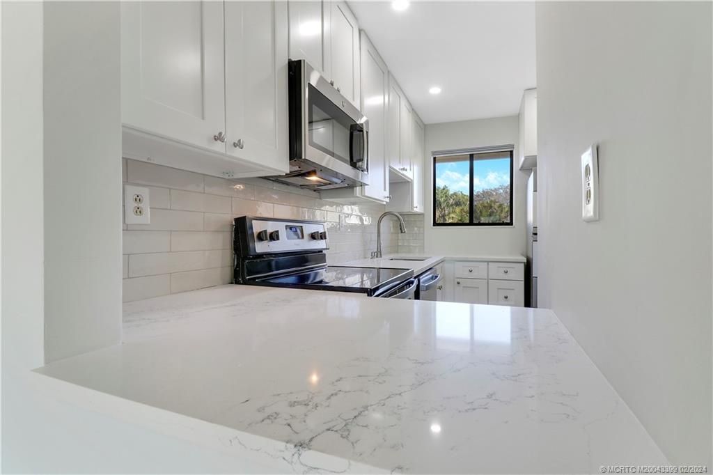 Photo of 5313 SE Miles Grant Road #202, Stuart, FL 34997 (MLS # M20043399)