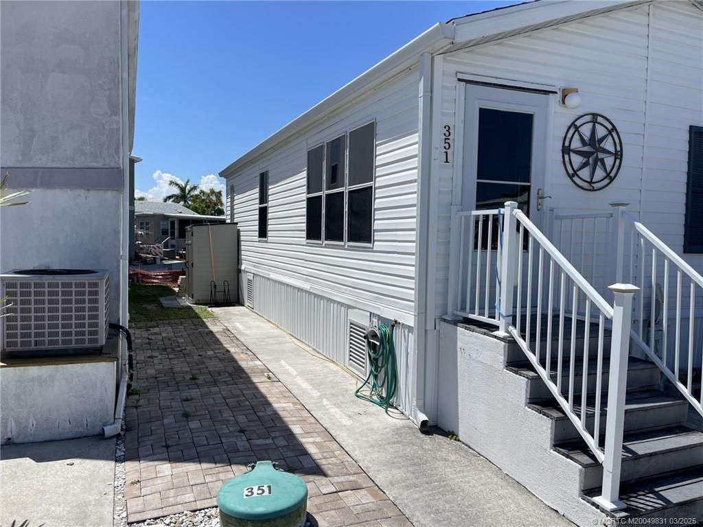 Photo of 351 Nettles Boulevard, Jensen Beach, FL 34957 (MLS # M20049831)