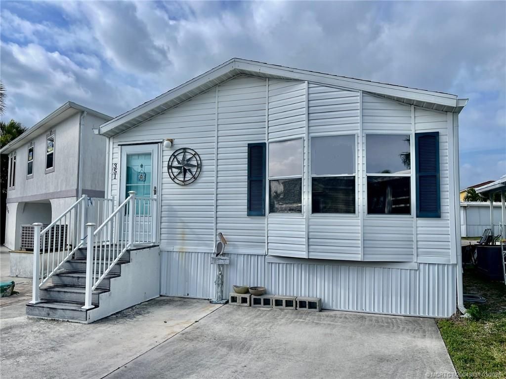 Photo of 351 Nettles Boulevard, Jensen Beach, FL 34957 (MLS # M20049831)