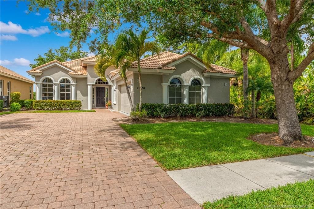 Photo of 4420 NW Royal Oak Drive, Jensen Beach, FL 34957 (MLS # M20050225)