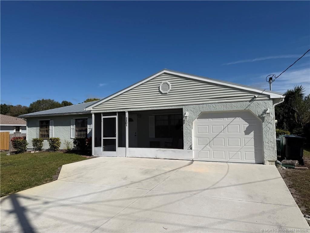 Photo of 2401 SE Avalon Road, Port Saint Lucie, FL 34952 (MLS # M20053857)