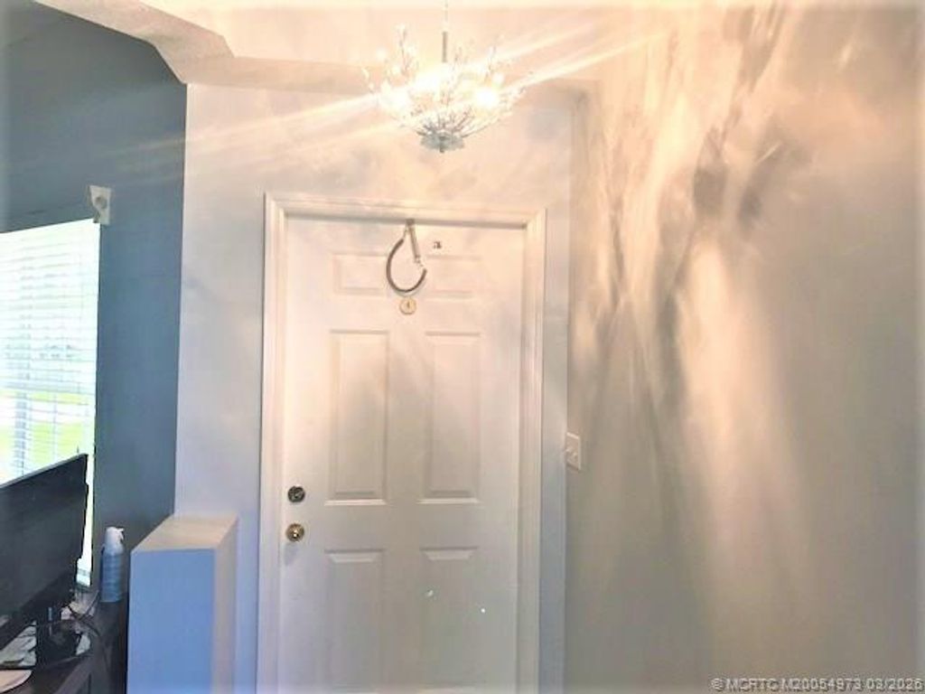 Photo of 3486 SW Pindo Palm Lane, Palm City, FL 34990 (MLS # M20054973)