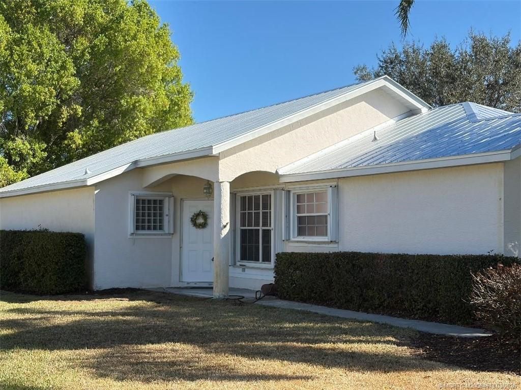 Photo of 3486 SW Pindo Palm Lane, Palm City, FL 34990 (MLS # M20054973)