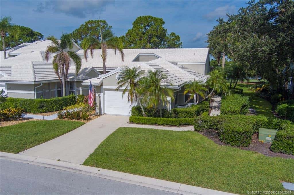 Photo of 2406 SW Foxpoint Trail, Palm City, FL 34990 (MLS # M20056302)