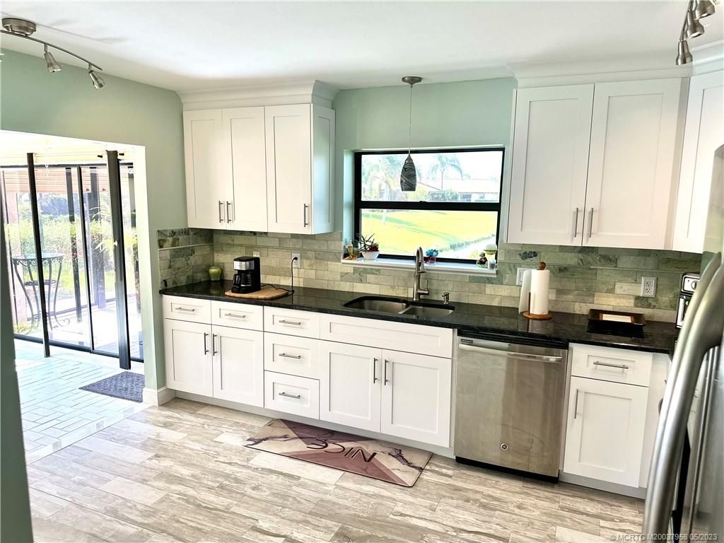 Photo of 2299 SW Bobalink Court, Palm City, FL 34990 (MLS # M20037958)