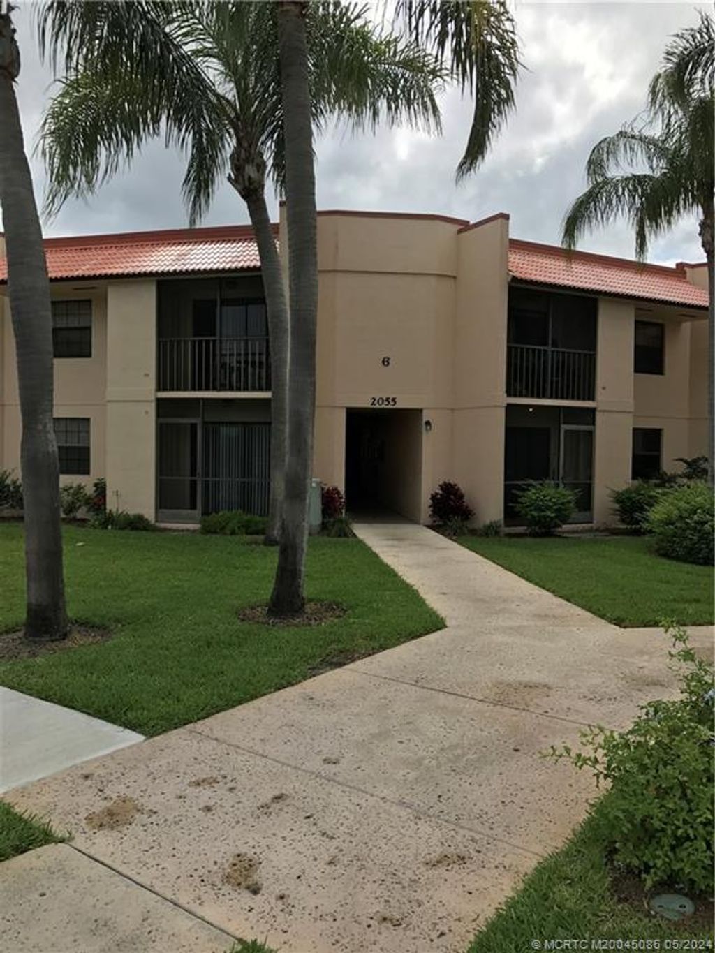 Photo of 2055 NE Collins Circle #6-40, Jensen Beach, FL 34957 (MLS # M20045086)
