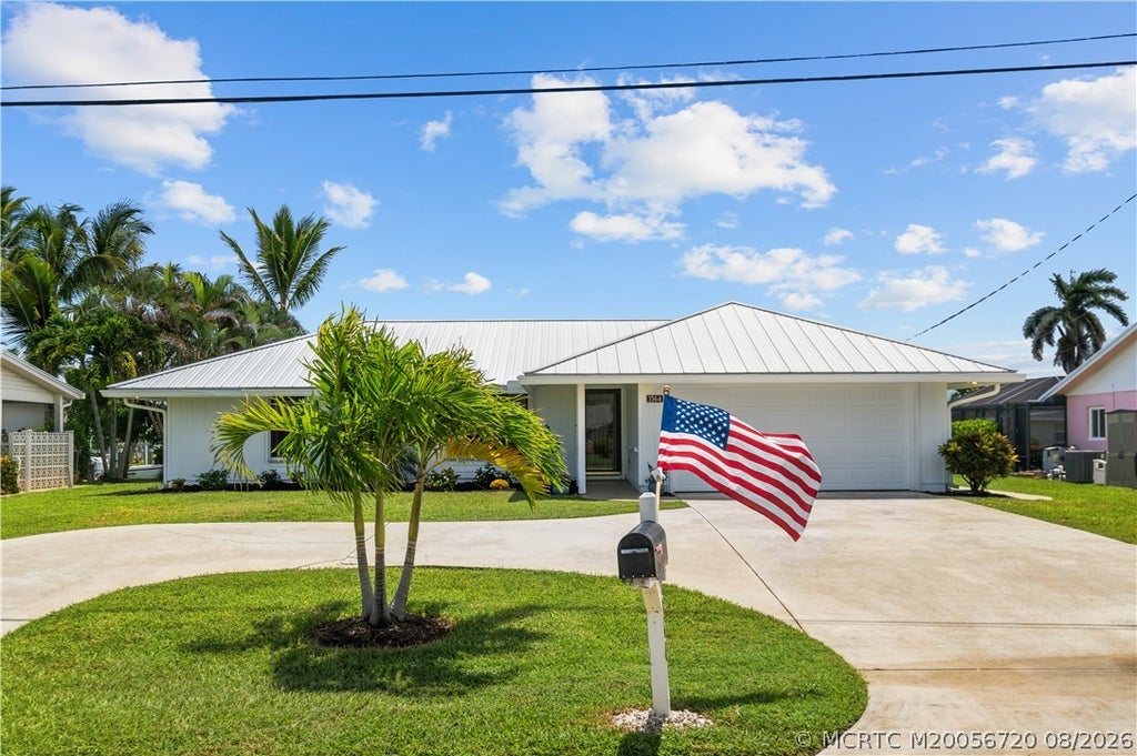 Photo of 1364 SW Egret Way, Palm City, FL 34990 (MLS # M20056720)