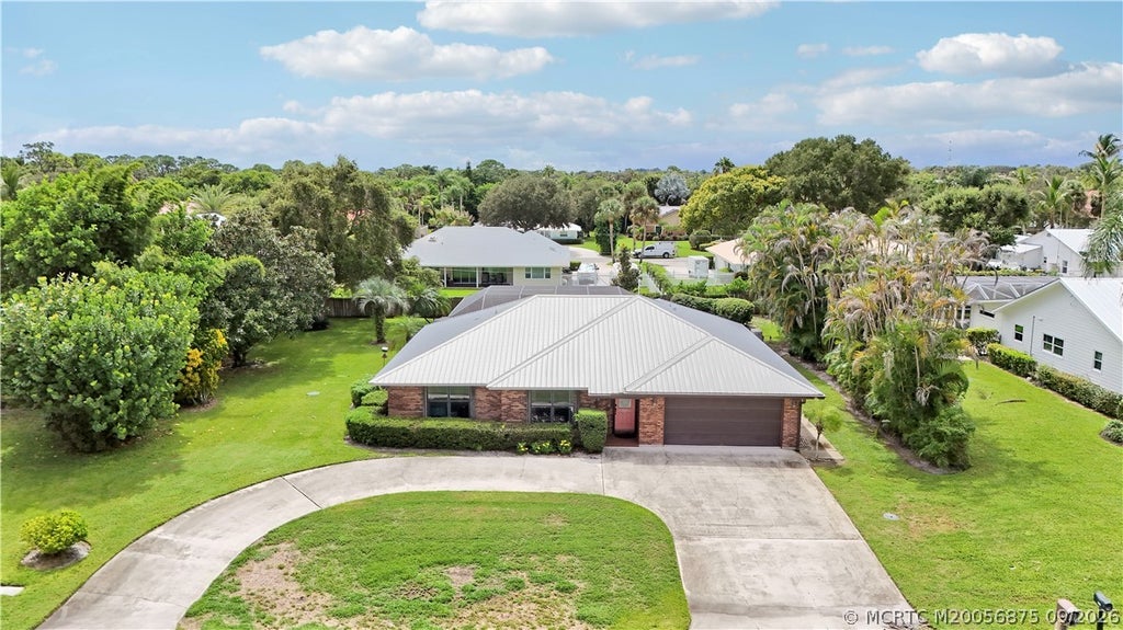 Photo of 8303 SE Cumberland Circle, Hobe Sound, FL 33455 (MLS # M20056875)