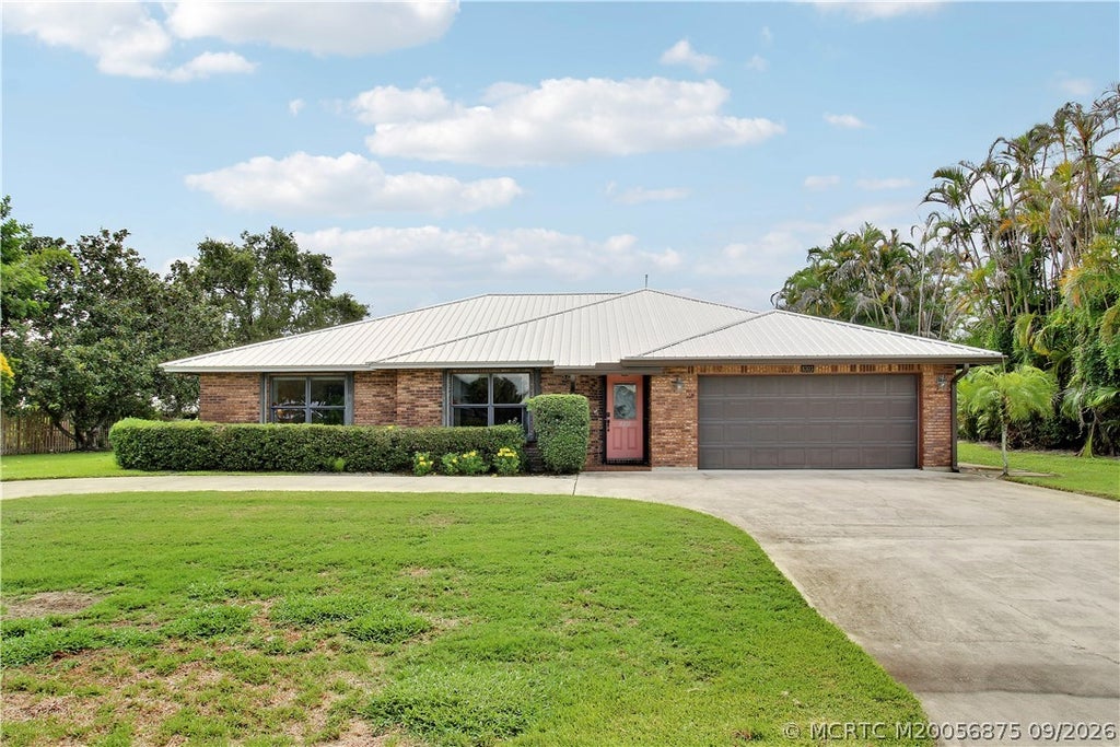 Photo of 8303 SE Cumberland Circle, Hobe Sound, FL 33455 (MLS # M20056875)
