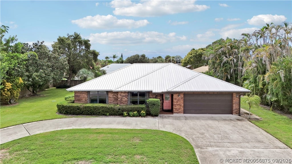 Photo of 8303 SE Cumberland Circle, Hobe Sound, FL 33455 (MLS # M20056875)
