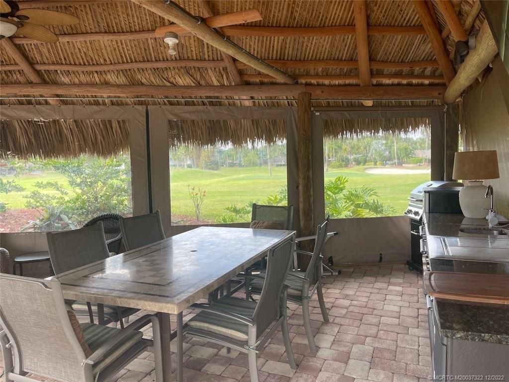 Photo of 370 NW Foursome Lane, Port Saint Lucie, FL 34986 (MLS # M20037322)