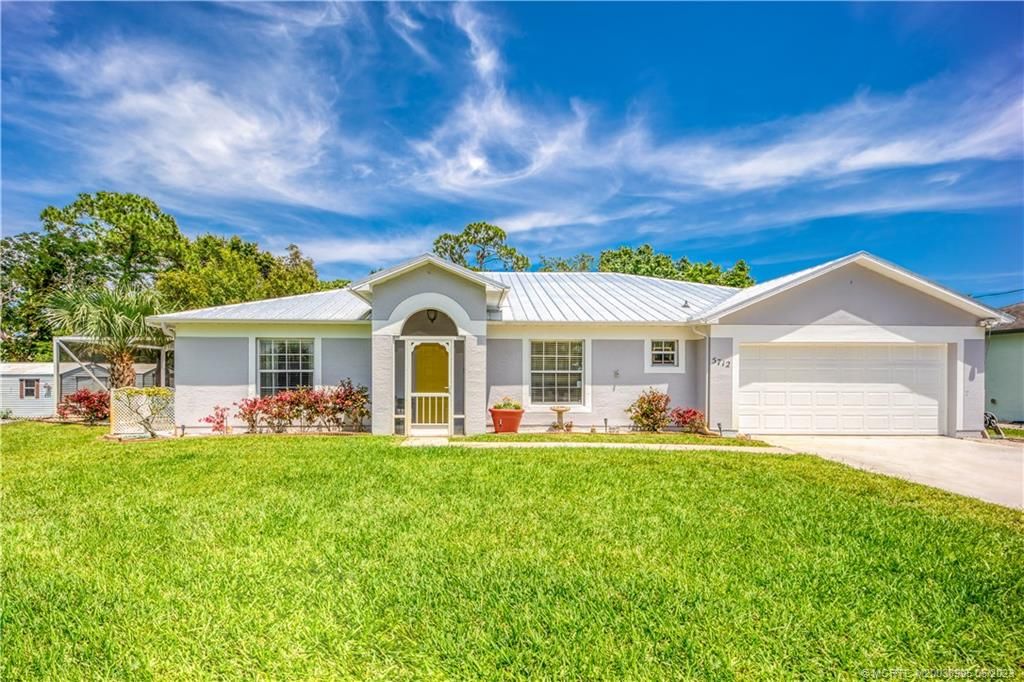 Photo of 5712 Tangelo Drive, Fort Pierce, FL 34982 (MLS # M20038995)