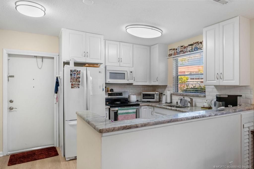 Photo of 2600 SE Ocean Boulevard #H7, Stuart, FL 34996 (MLS # M20050162)