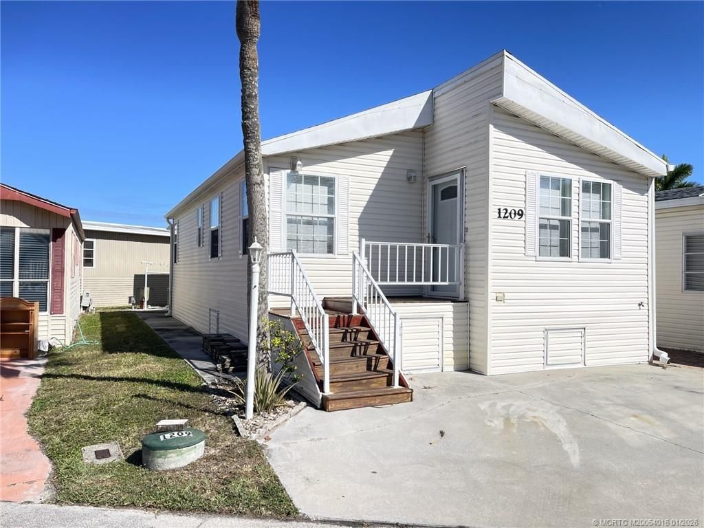 Photo of 1209 Nettles Boulevard, Jensen Beach, FL 34957 (MLS # M20054016)