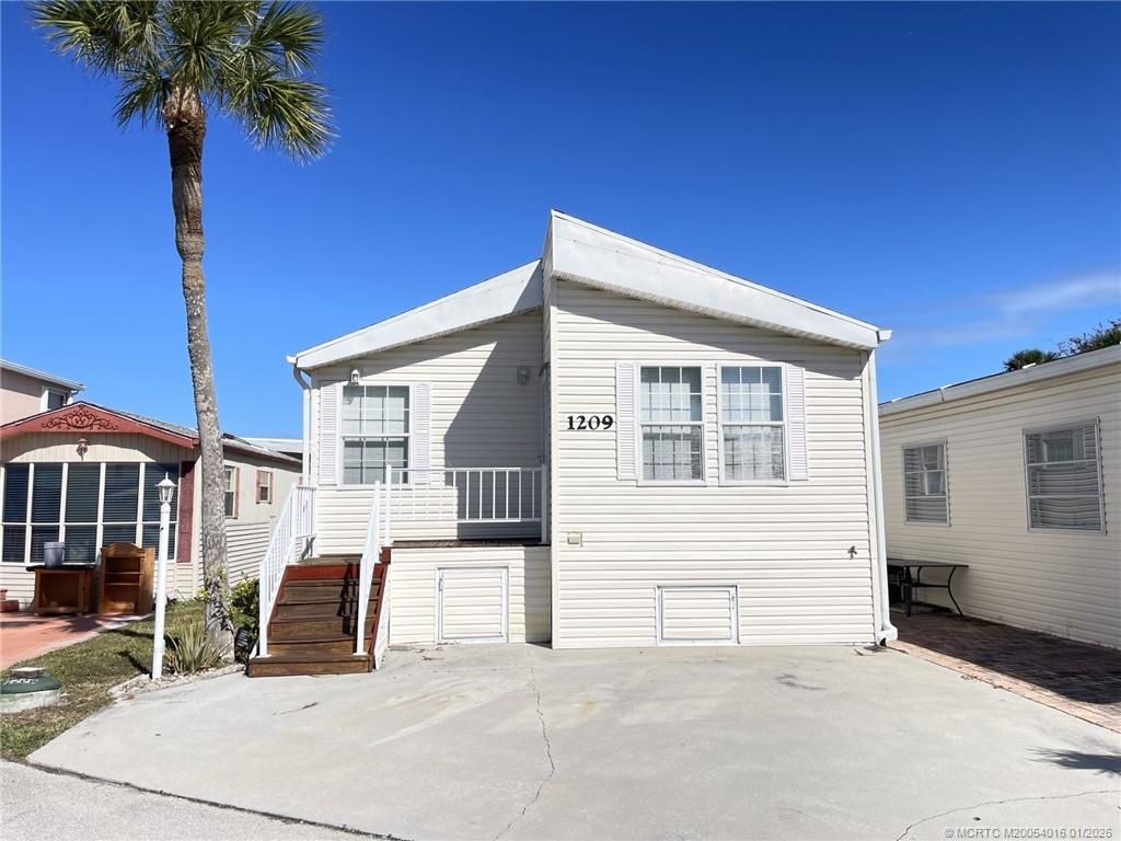 Photo of 1209 Nettles Boulevard, Jensen Beach, FL 34957 (MLS # M20054016)