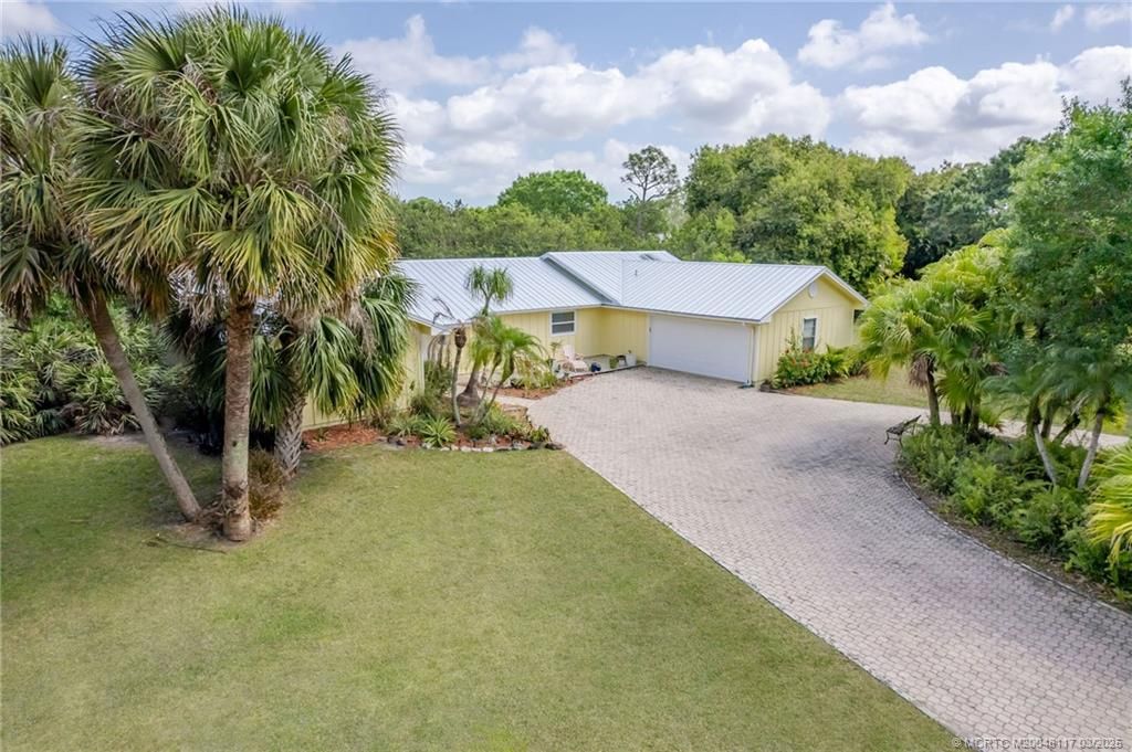 Photo of 7121 SW Gembrook Drive, Stuart, FL 34997 (MLS # M20048117)