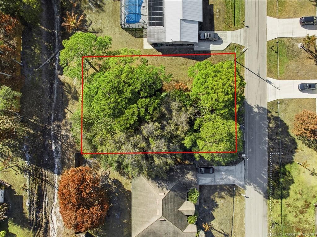 Photo of 609 SW Curtis Street, Port Saint Lucie, FL 34983 (MLS # M20054376)