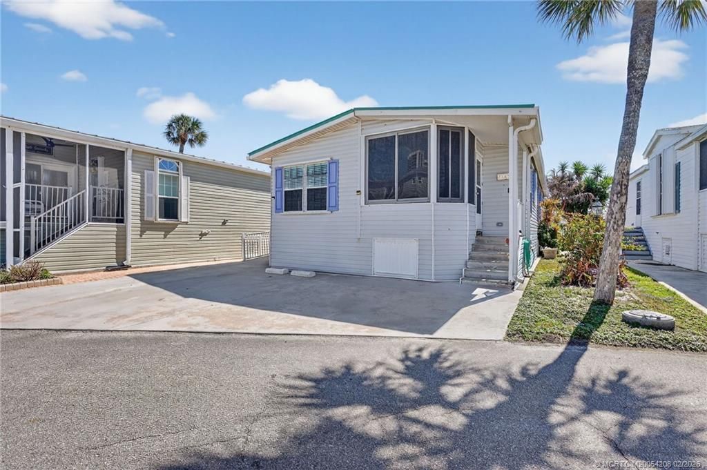 Photo of 2115 Nettles Boulevard, Jensen Beach, FL 34957 (MLS # M20054208)