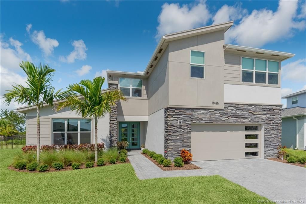 Photo of 11485 SW Lyra Drive, Port Saint Lucie, FL 34987 (MLS # M20040481)