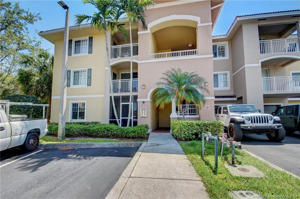 Photo of 6530 Emerald Dunes Drive #201, West Palm Beach, FL 33411 (MLS # M20045433)