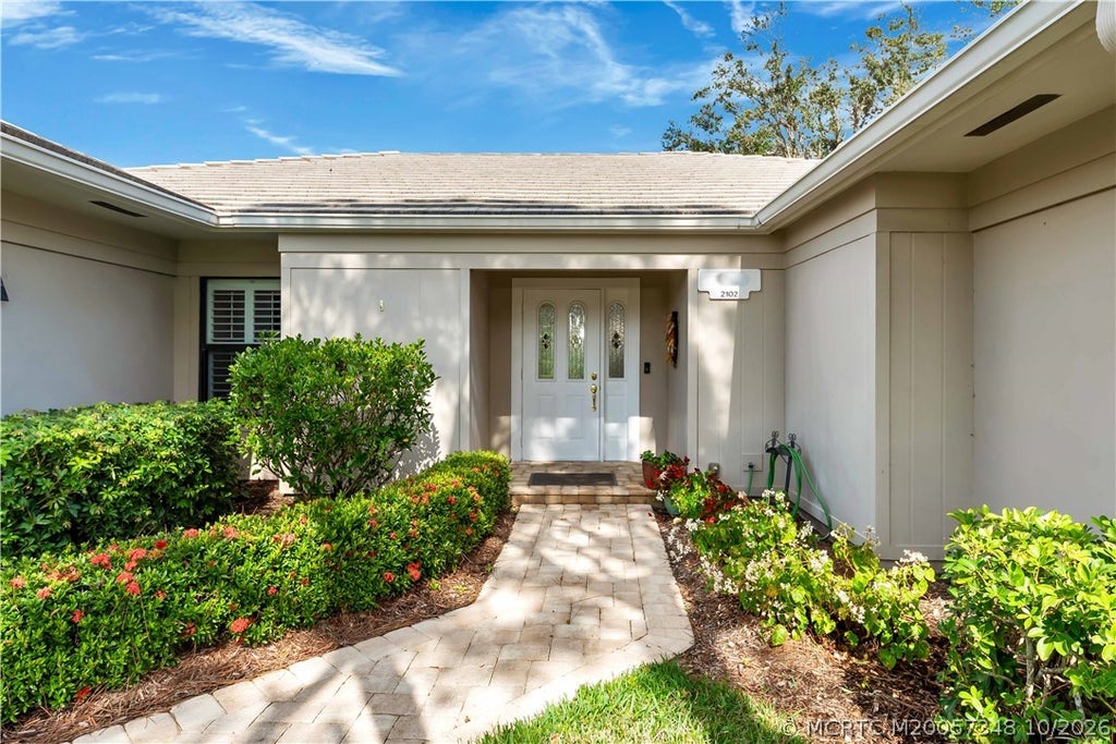 Photo of 2102 NW Greenbriar Lane, Palm City, FL 34990 (MLS # M20057348)