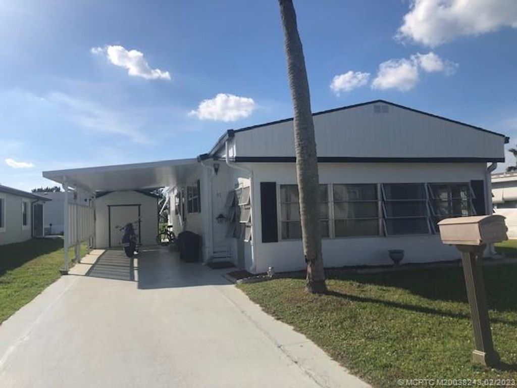 Photo of 57 Golf Drive, Port Saint Lucie, FL 34952 (MLS # M20038243)