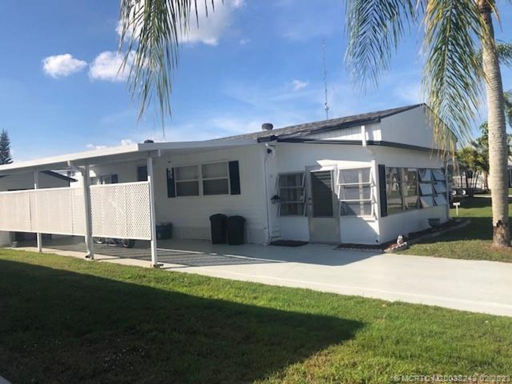 Photo of 57 Golf Drive, Port Saint Lucie, FL 34952 (MLS # M20038243)