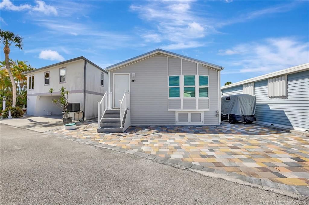 Photo of 351 Nettles Boulevard, Jensen Beach, FL 34957 (MLS # M20052992)