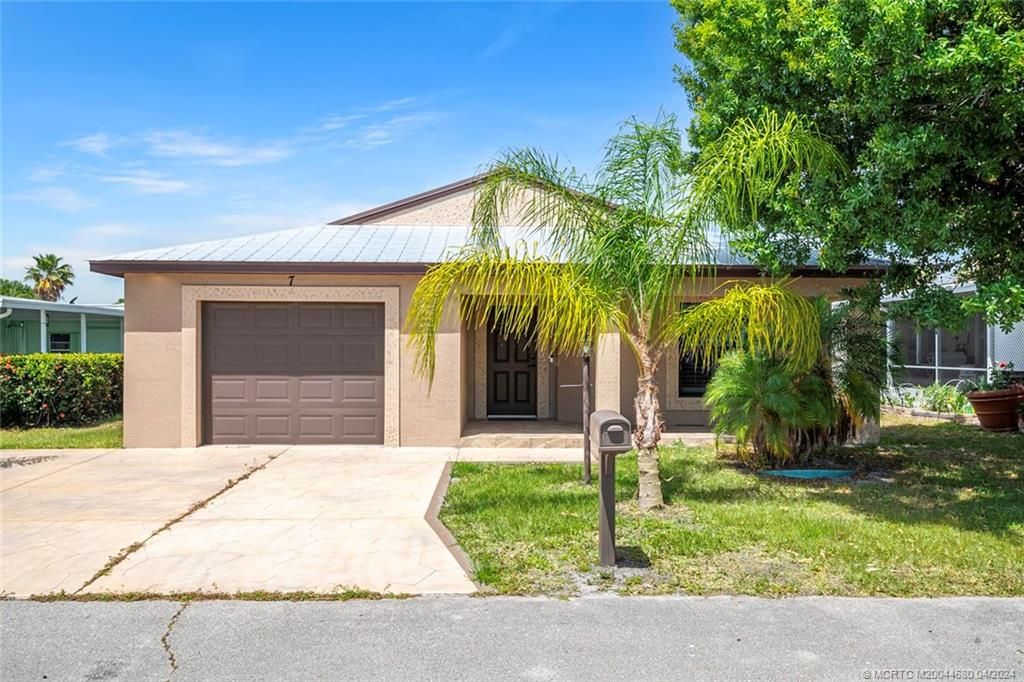 Photo of 7 Kassaba Lane, Port Saint Lucie, FL 34952 (MLS # M20044680)