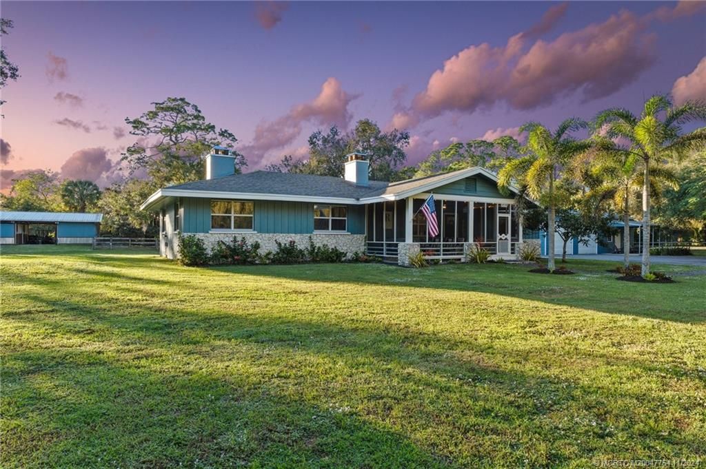 Photo of 7770 SW Parkway Drive, Stuart, FL 34997 (MLS # M20047754)