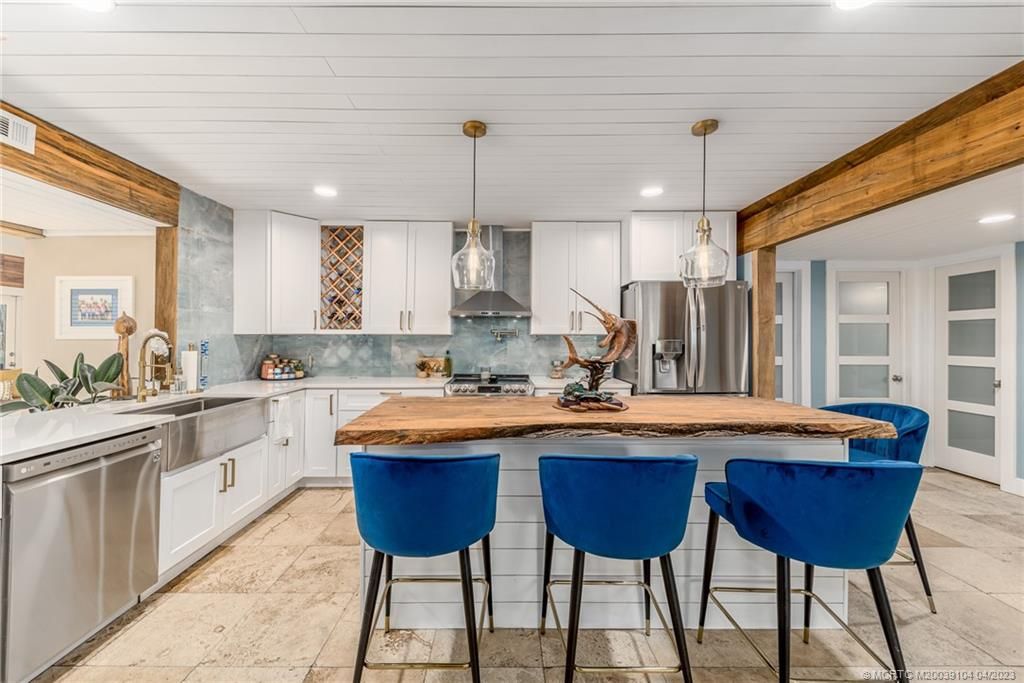 Photo of 1240 SW Covered Bridge Drive, Palm City, FL 34990 (MLS # M20039104)