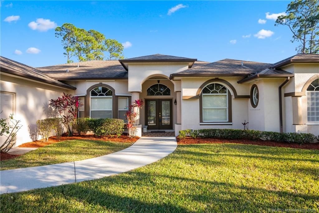 Photo of 1687 SW Import Drive, Port Saint Lucie, FL 34953 (MLS # M20048292)