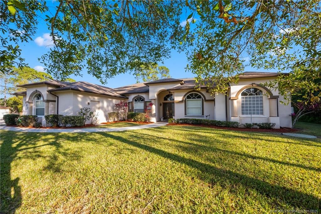 Photo of 1687 SW Import Drive, Port Saint Lucie, FL 34953 (MLS # M20048292)