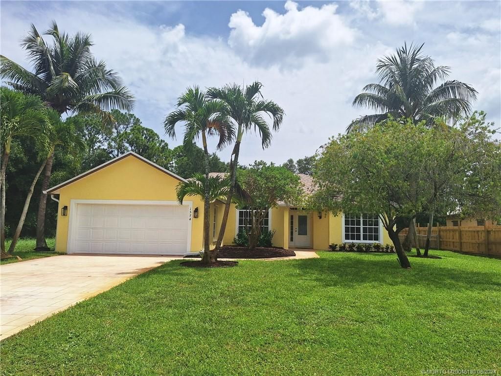 Photo of 1574 SE Minorca Avenue, Port Saint Lucie, FL 34952 (MLS # M20046120)