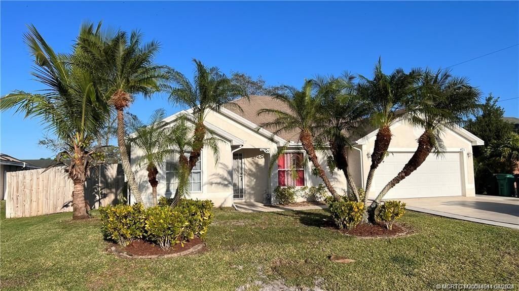 Photo of 471 NW Raymond Lane NW, Port Saint Lucie, FL 34983 (MLS # M20044541)