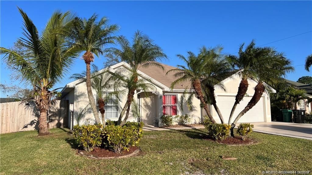 Photo of 471 NW Raymond Lane NW, Port Saint Lucie, FL 34983 (MLS # M20044541)