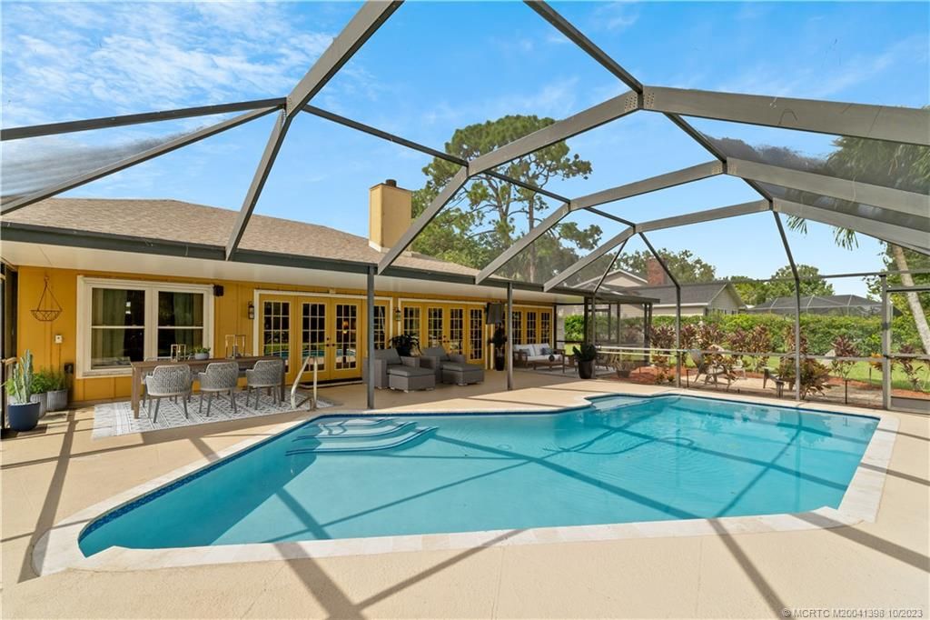 Photo of 2897 SE Italy Street, Port Saint Lucie, FL 34952 (MLS # M20041398)