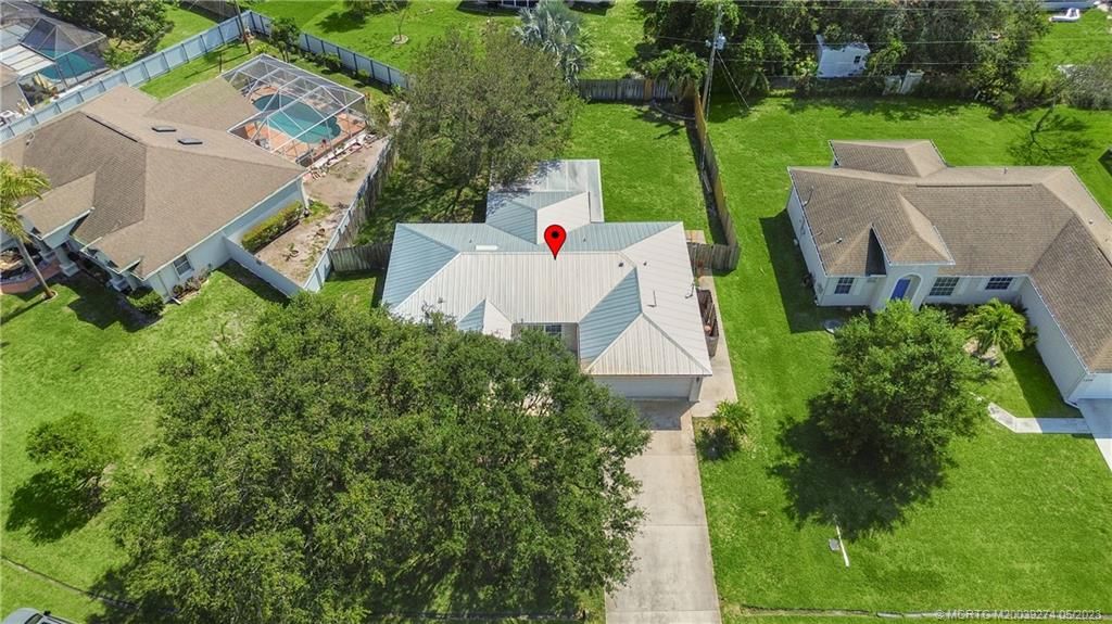 Photo of 2441 SE Camarin Street, Port Saint Lucie, FL 34952 (MLS # M20039274)