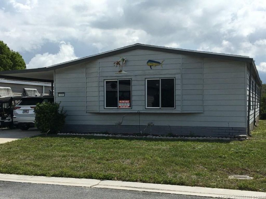 Photo of 14391 SW Divot Drive Dr, Indiantown, FL 34956 (MLS # M20055356)