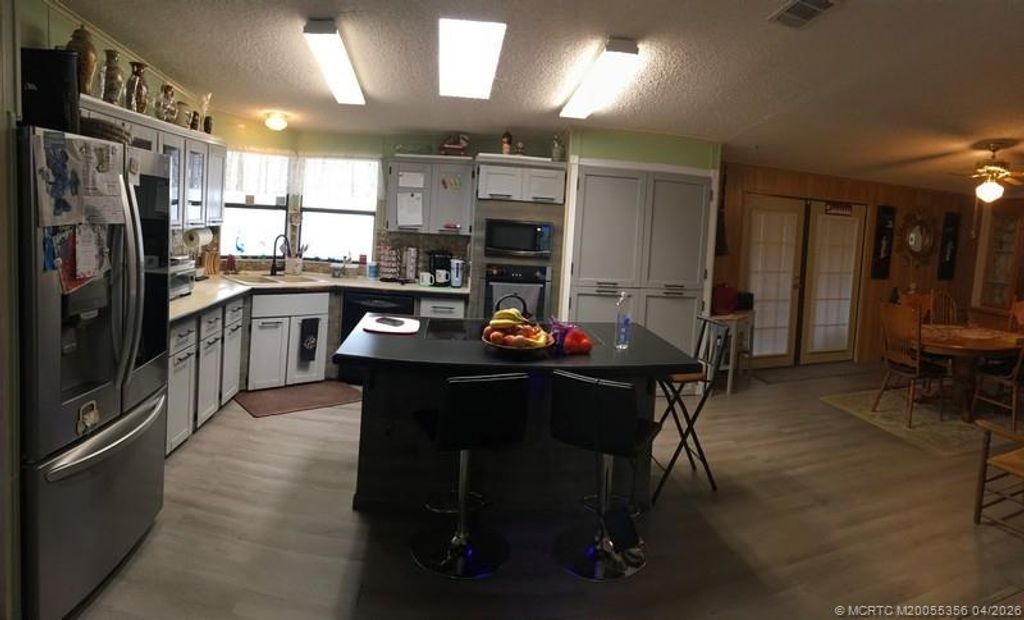 Photo of 14391 SW Divot Drive Dr, Indiantown, FL 34956 (MLS # M20055356)