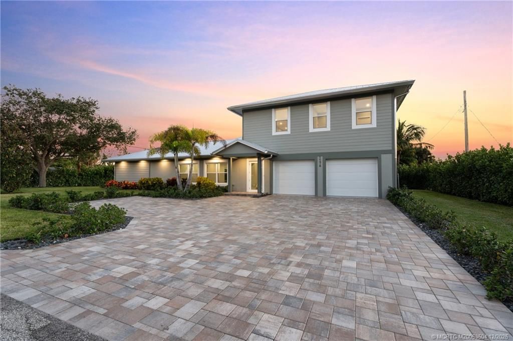 Photo of 1176 NE Terrace Way, Jensen Beach, FL 34957 (MLS # M20053504)