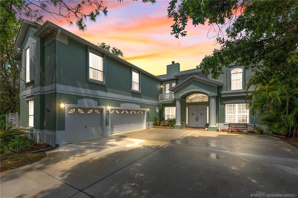 Photo of 10201 SW Tarzan Terrace, Palm City, FL 34990 (MLS # M20038994)