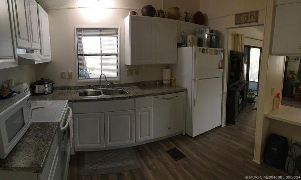 Photo of 15925 Indianwood Circle SW, Indiantown, FL 34956 (MLS # M20046985)